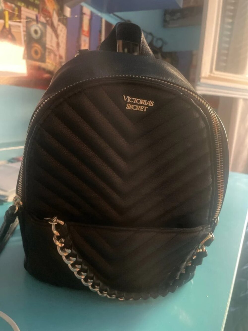 Black Quilted Mini Backpack with Chain Detail